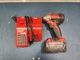 Milwaukee 2850-20  1/4"  Driver with Battery and Charger